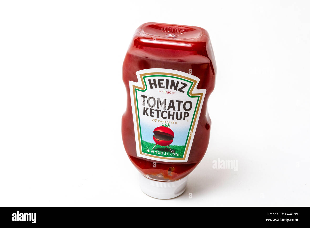 Heinz Tomato Ketchup dans une bouteille de plastique avec un barbecue en forme de tomate sur l'étiquette Banque D'Images