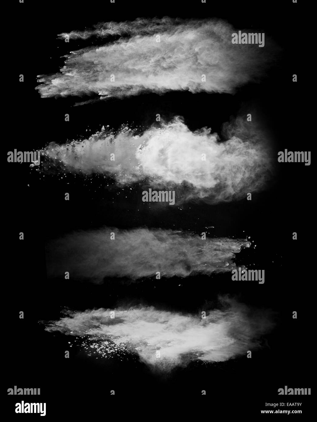 Motion de geler les explosions de poussière blanc isolé sur fond noir Banque D'Images
