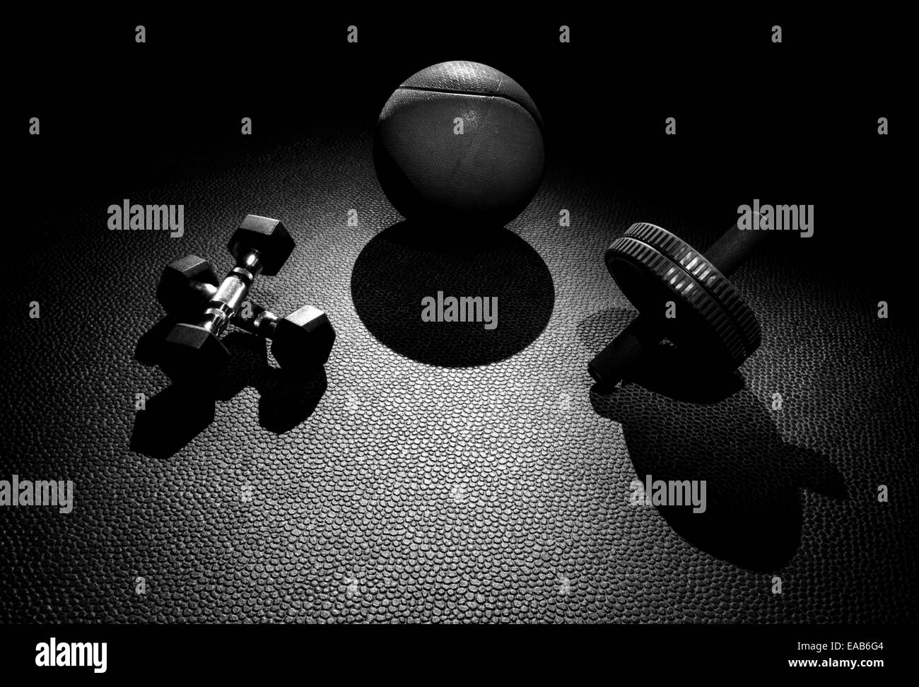 Il s'agit d'un certain poids de l'équipement qui a un éclairage dramatique sur elle pour la motivation. Banque D'Images