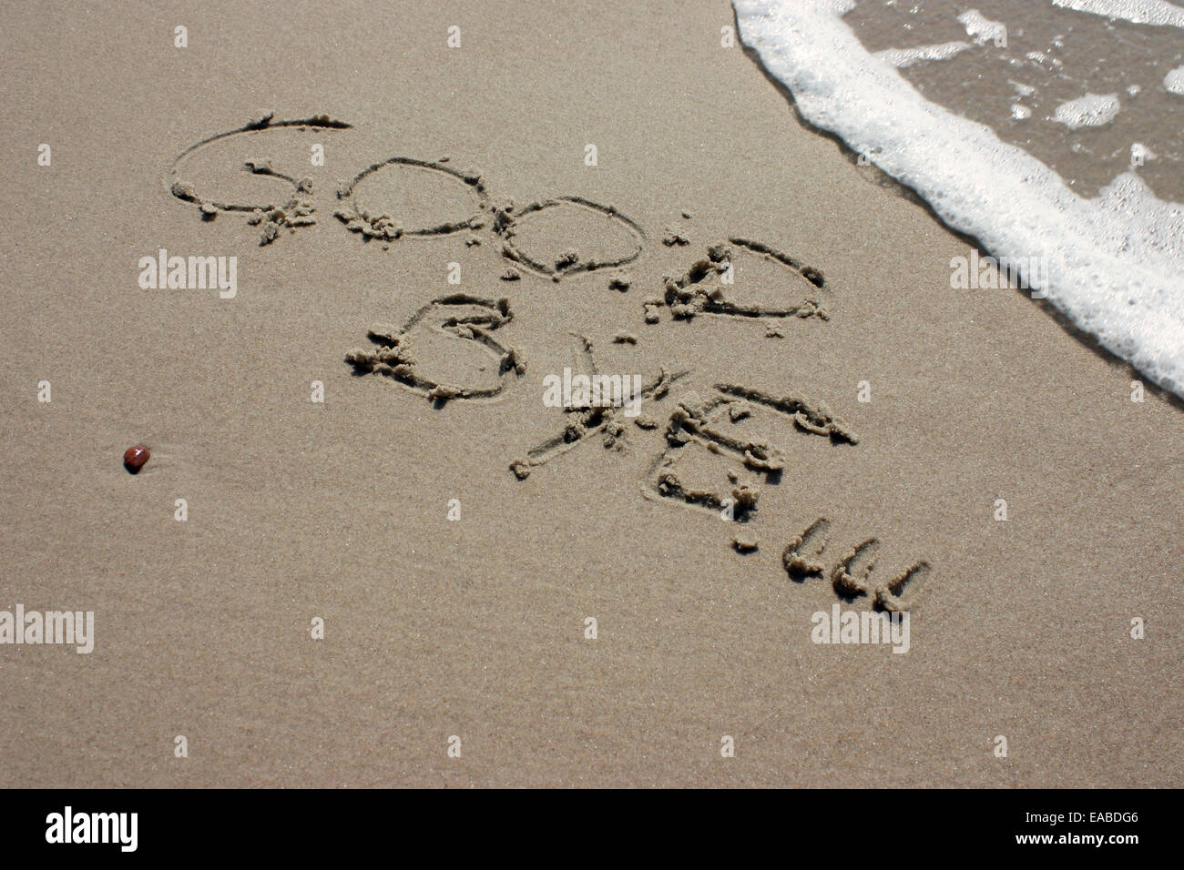 Au revoir les mots écrits sur le sable de la plage Banque D'Images