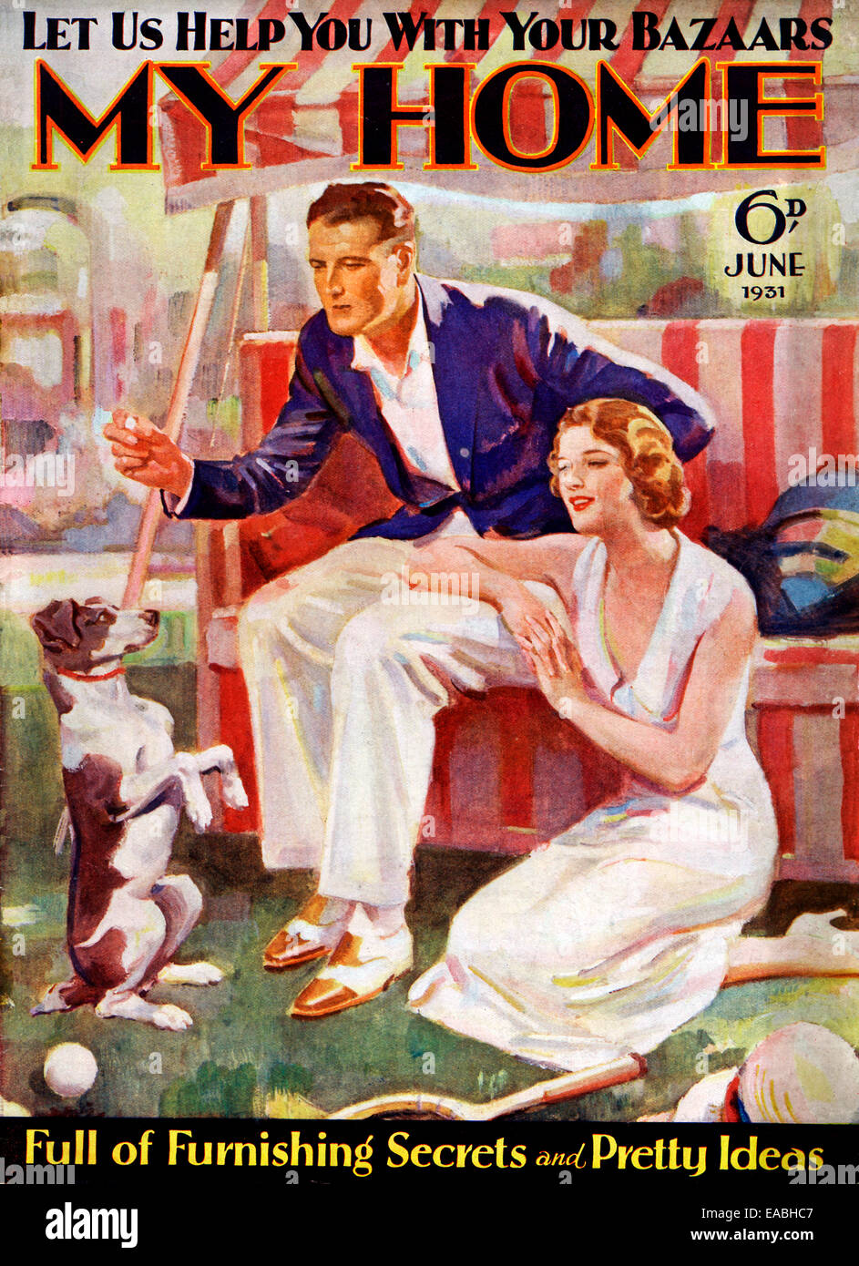 Ma maison, chien, 1931 Couverture du magazine anglais accueil et le style de la nouvelle classe moyenne de banlieue, jouant avec le chien dans le jardin et l'enseigner de nouveaux tours Banque D'Images