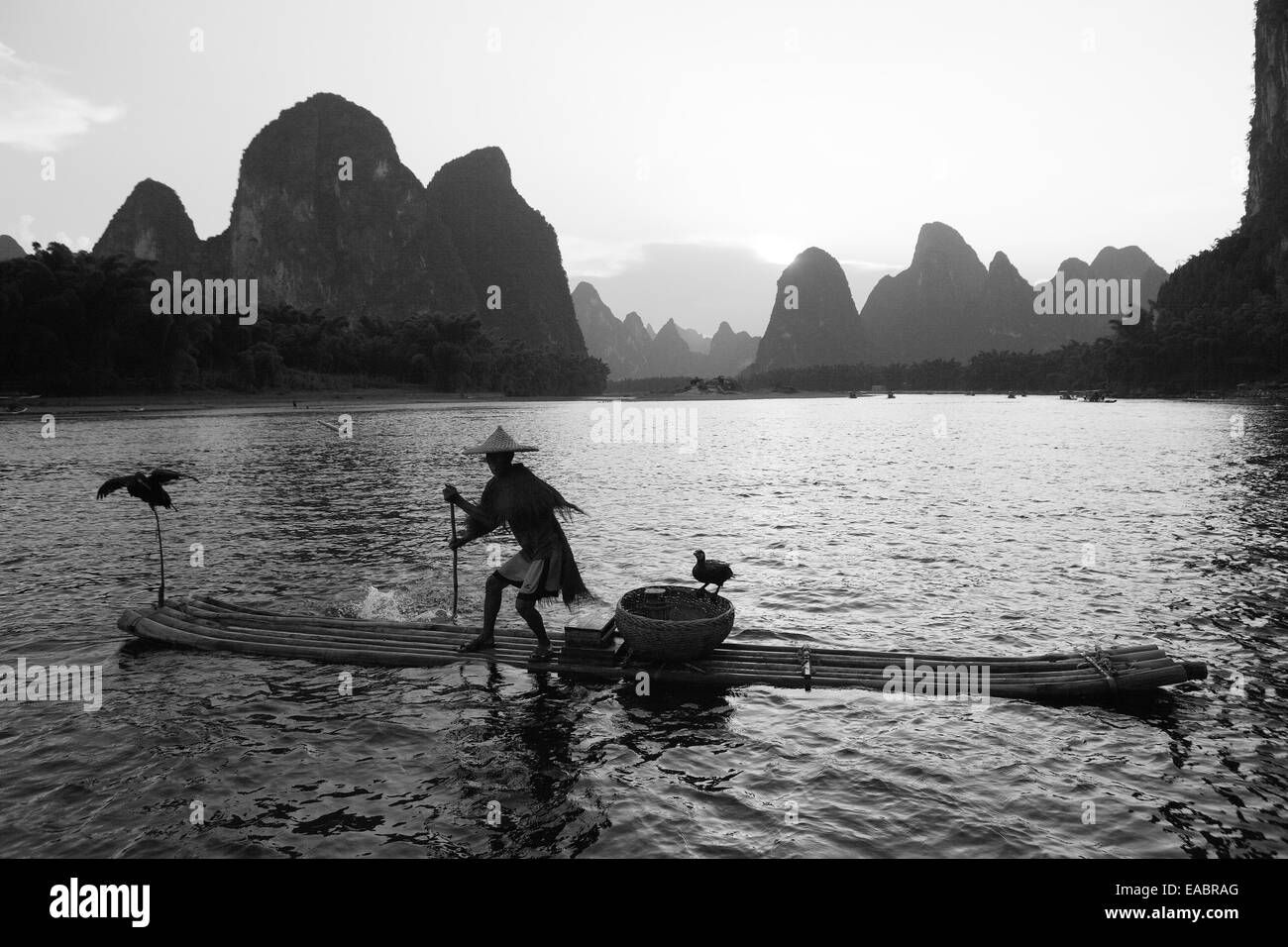 Chine Guangxi Xingping cormorant fisherman sur la rivière Li Banque D'Images