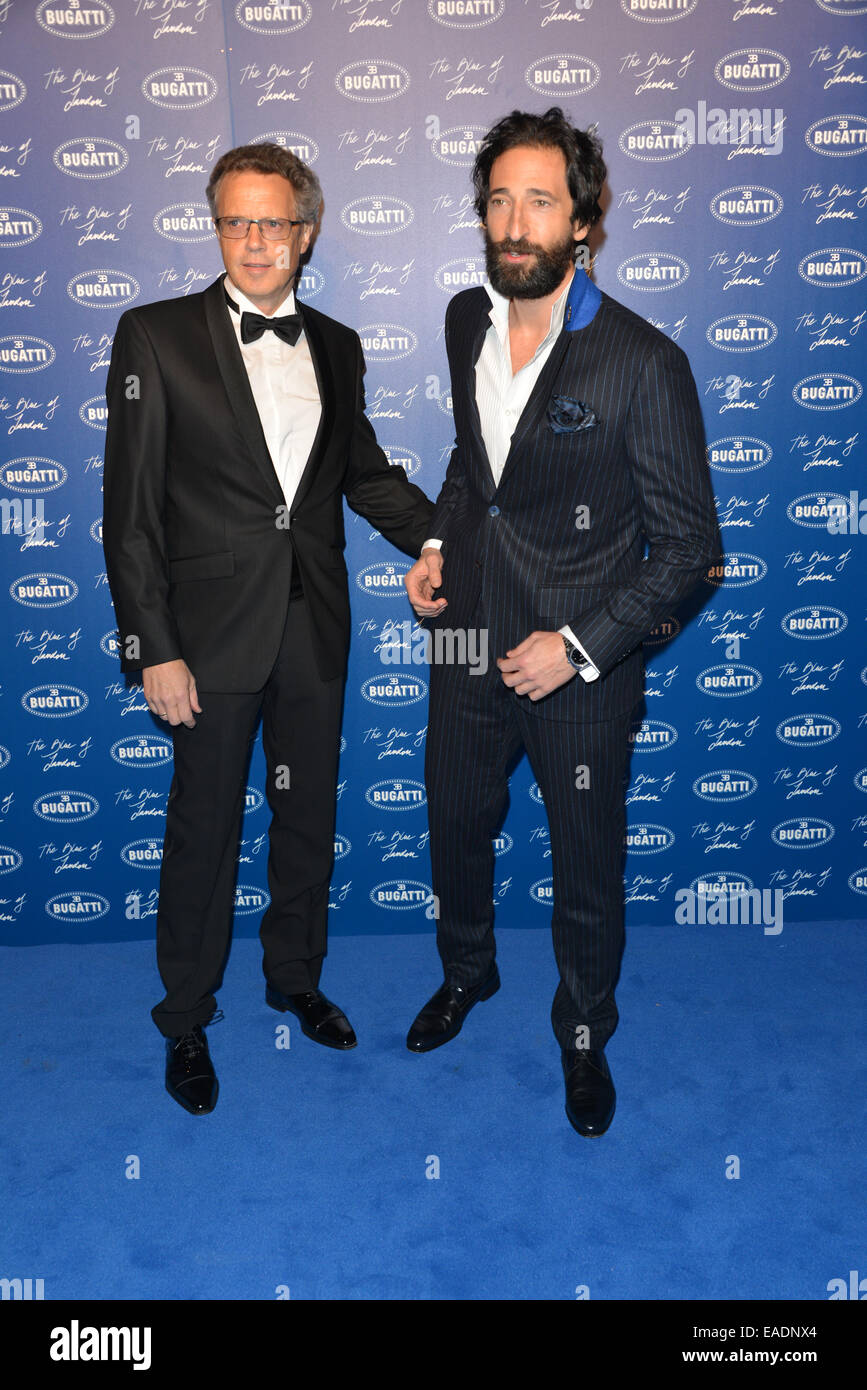 Londres, Royaume-Uni. 11 novembre, 2014. Wolfgang Dürheimer et Adrian Brody arrive sur le tapis bleu de la 'Mr Wolfgang Durheimer Président de Bugatti lance la première Boutique Style Bugatti à 24-26 Brompton Rd, London. Credit : Voir Li/Alamy Live News Banque D'Images