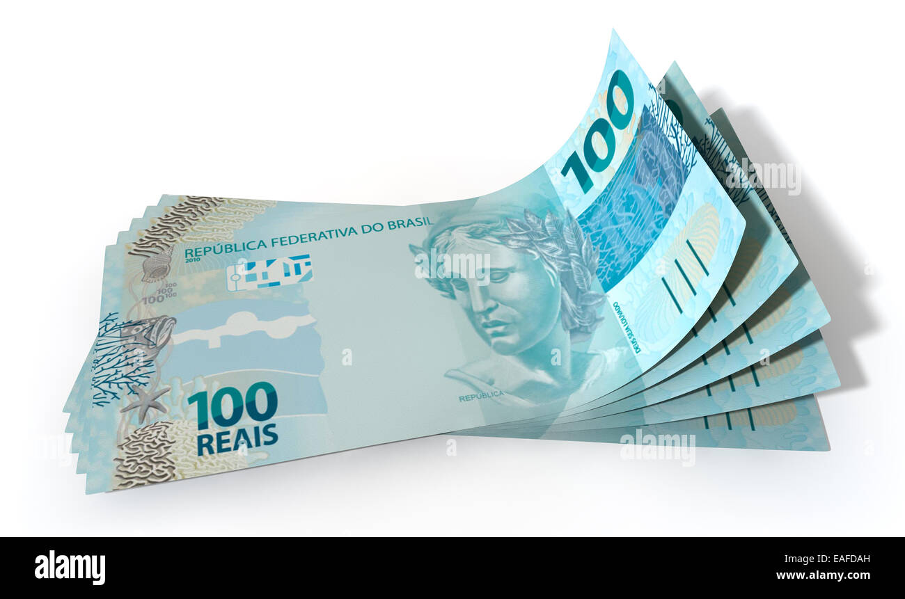 Un groupe de cinq billets réels ventilés et isolés sur un fond blanc Banque D'Images