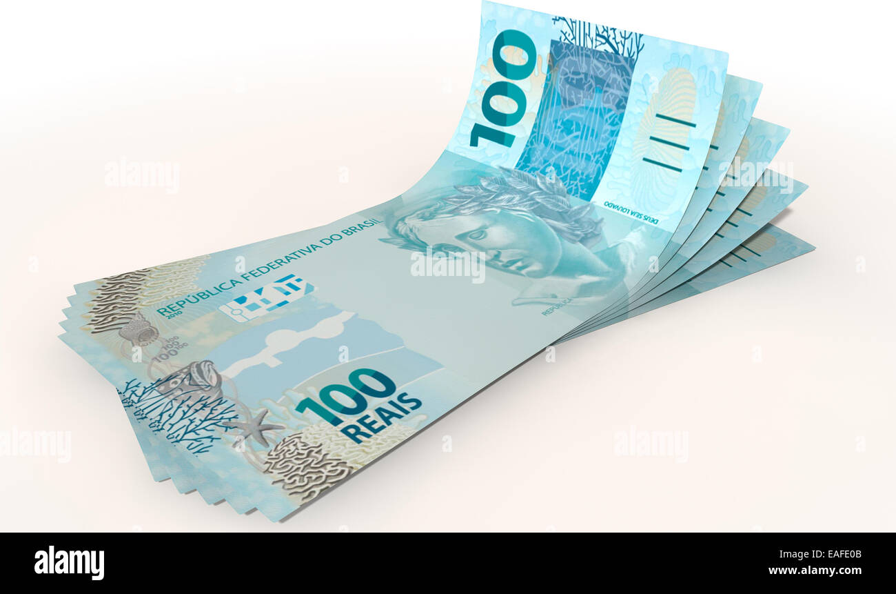 Un groupe de cinq billets réels ventilés et isolés sur un fond blanc Banque D'Images