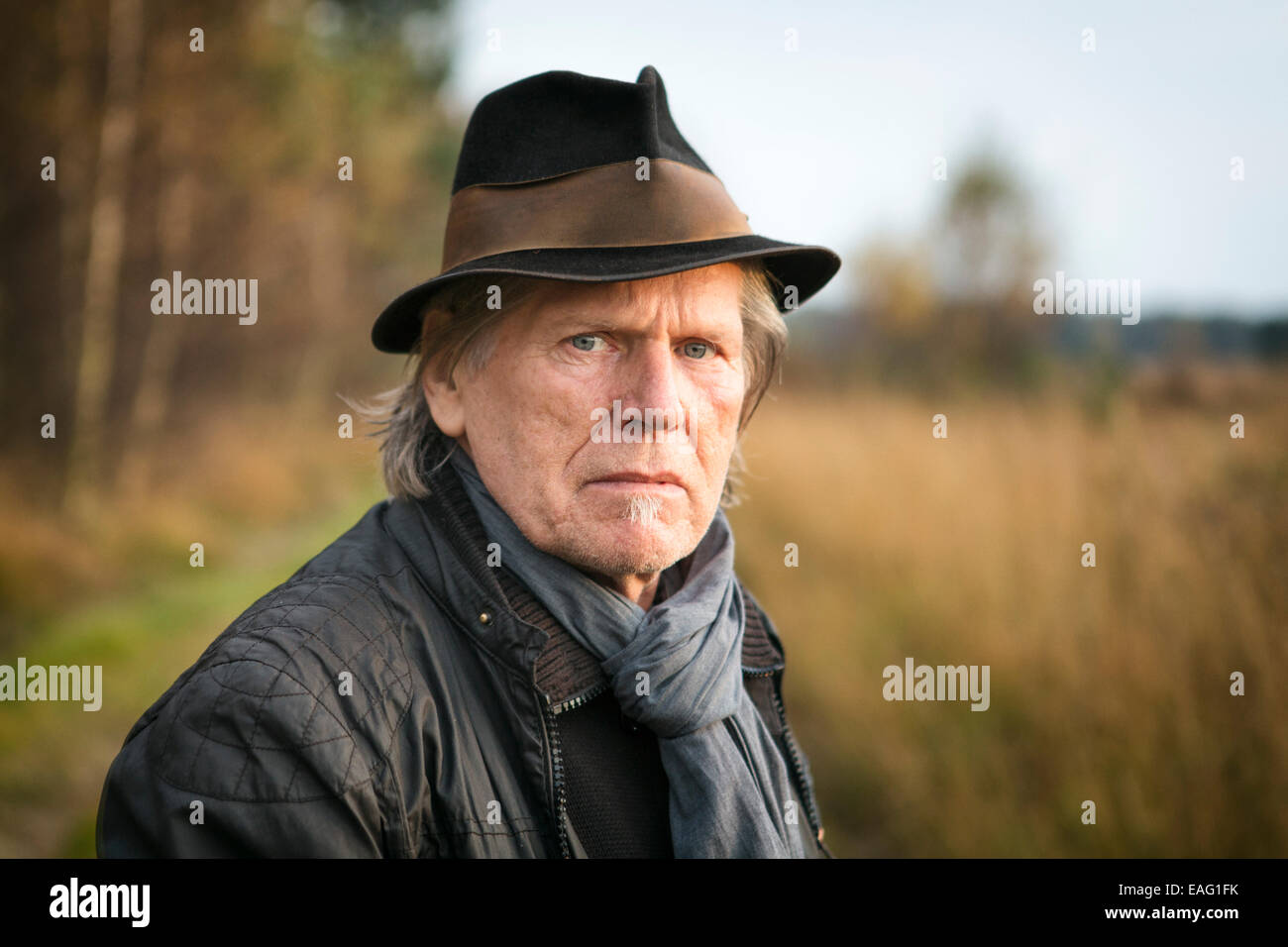 Man avec un chapeau et une petite barbiche Banque D'Images