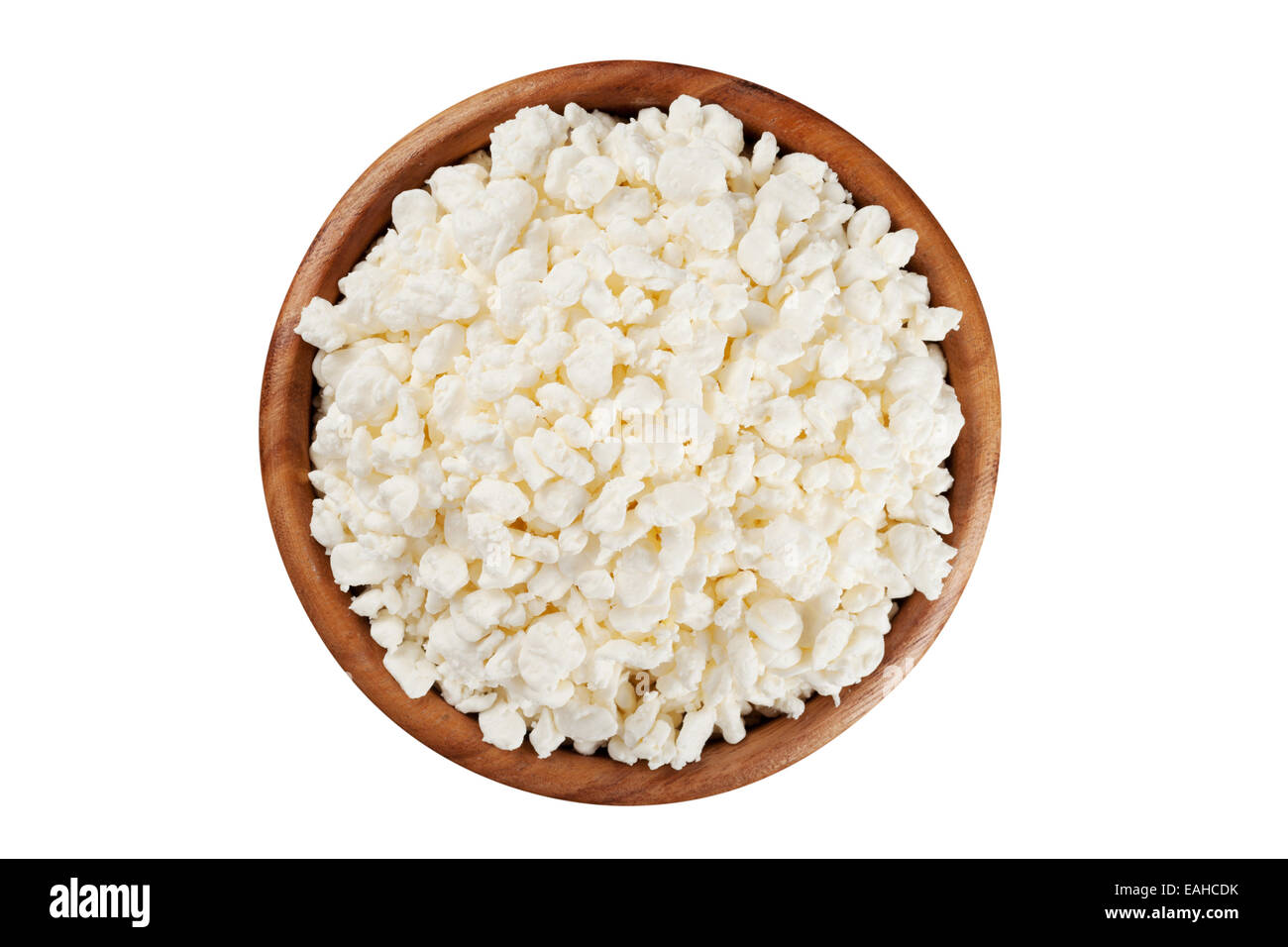 Le fromage cottage dans la plaque en bois rustique Banque D'Images