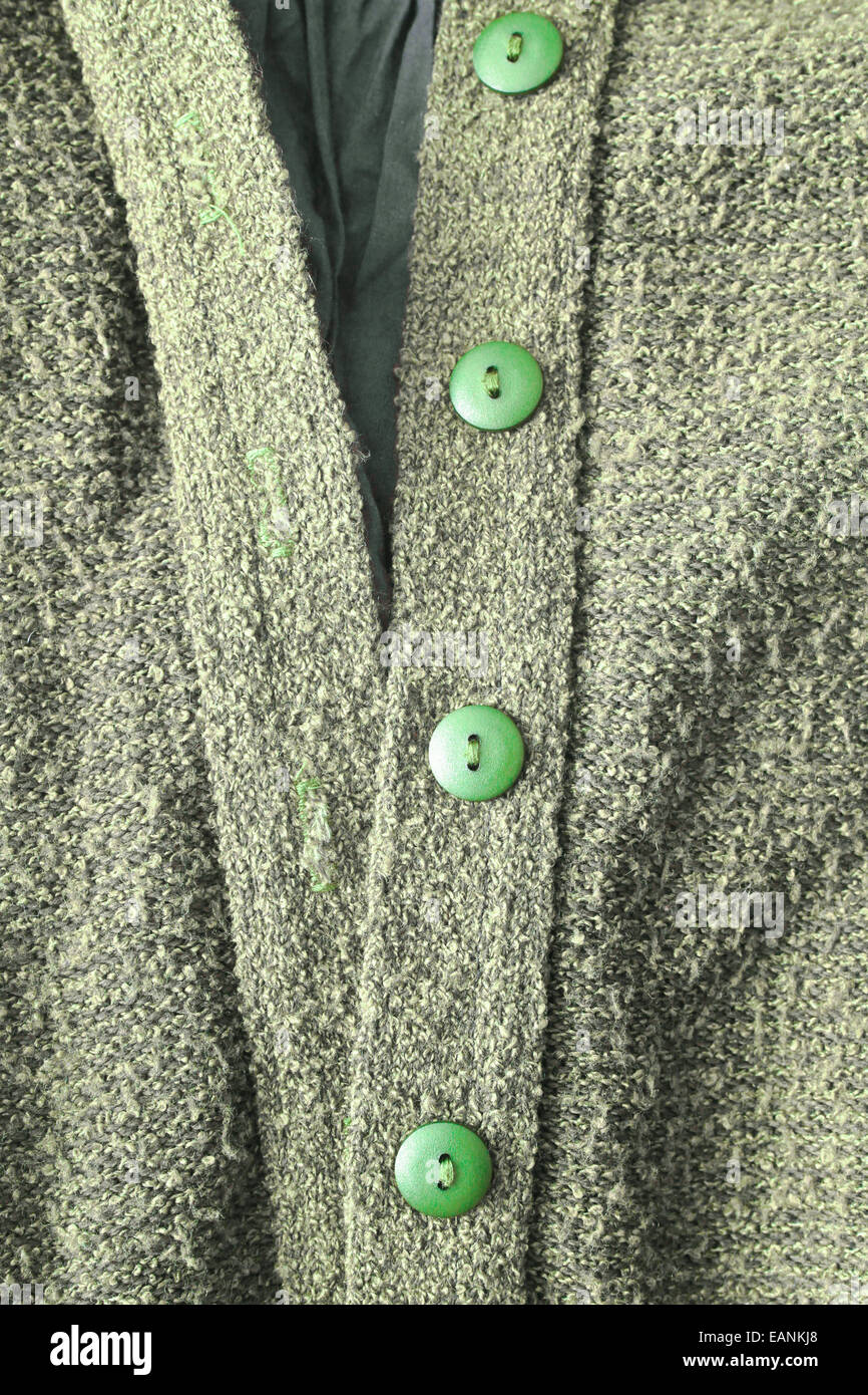 Close up de la partie d'un livre vert haut occasionnels avec des boutons Banque D'Images