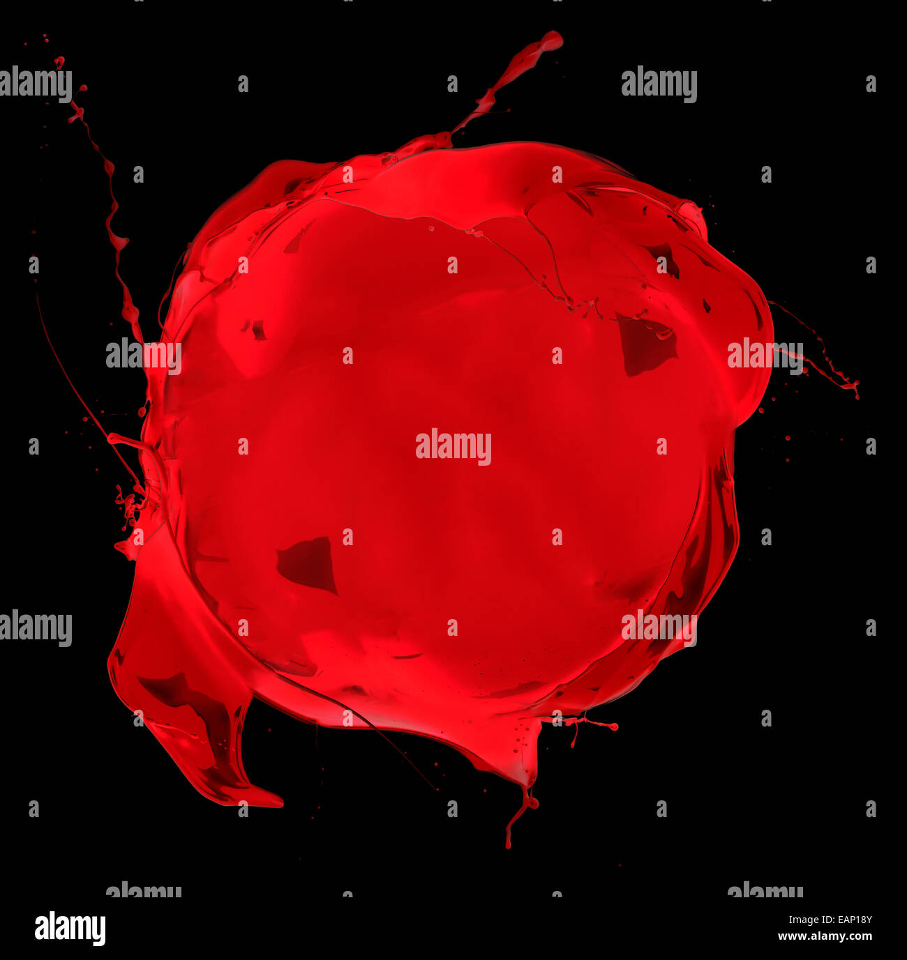 Coup de peinture rouge isolé sur fond noir blob Banque D'Images