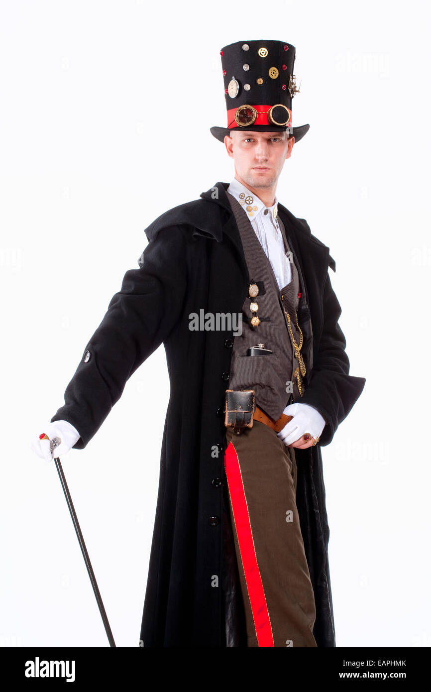 Portrait d'un magicien avec un chapeau, un long manteau et les détails des pièces d'horloge Banque D'Images