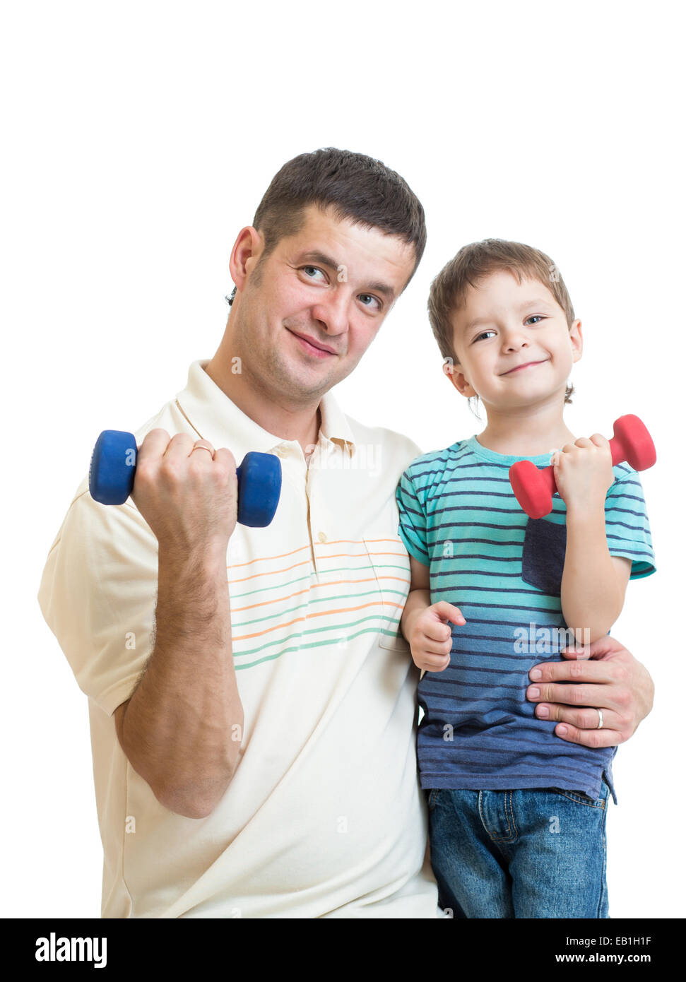 Père et kid boy doing exercise with dumbbells ensemble Banque D'Images