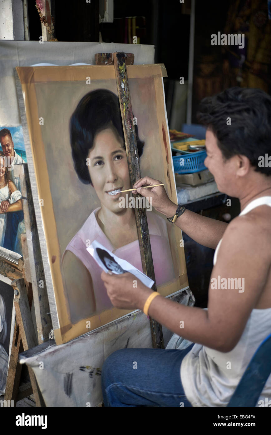 La peinture de l'artiste un portrait féminin à partir d'une photographie Banque D'Images