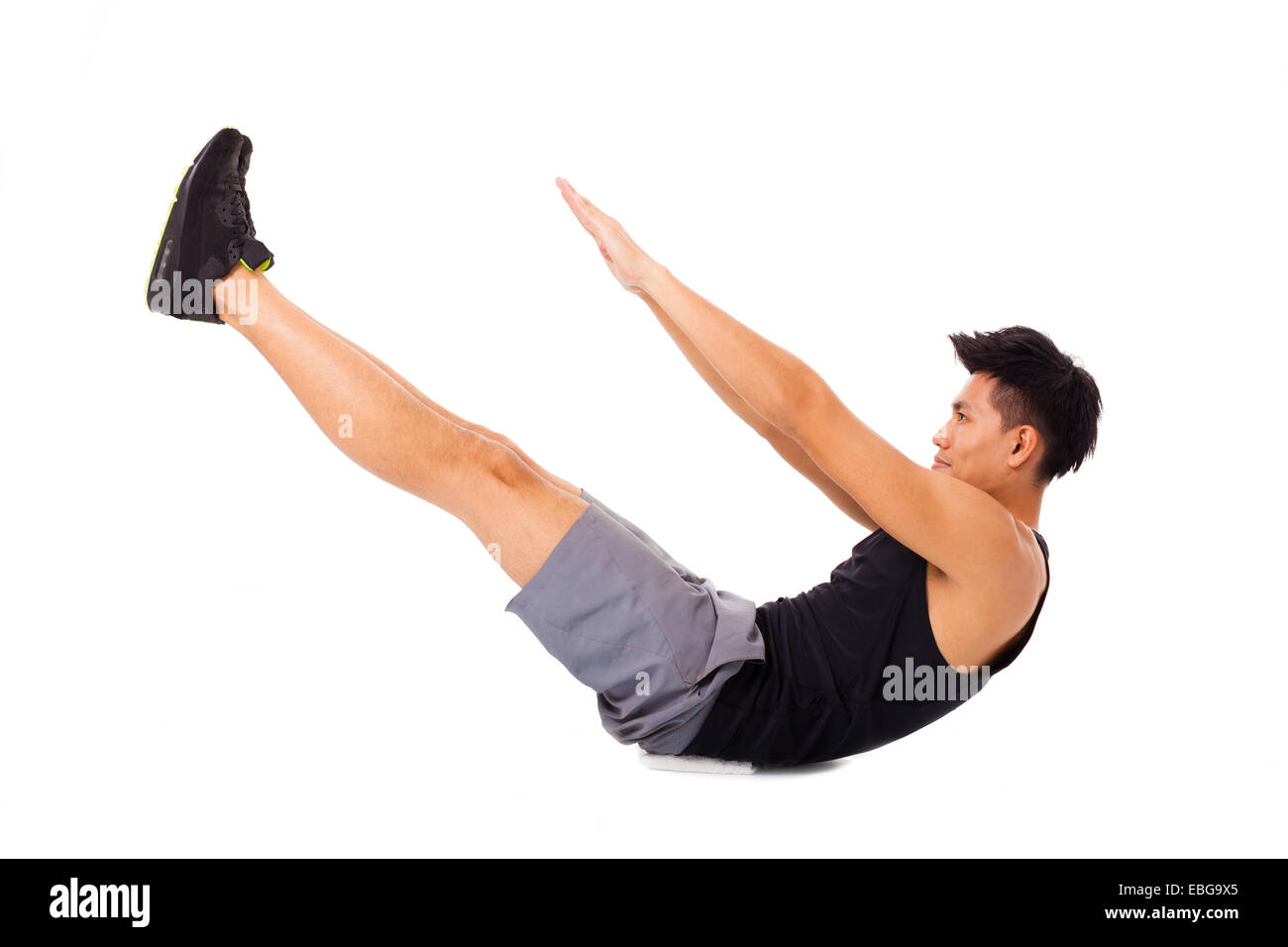 Young Asian Man Doing Exercise Banque D'Images