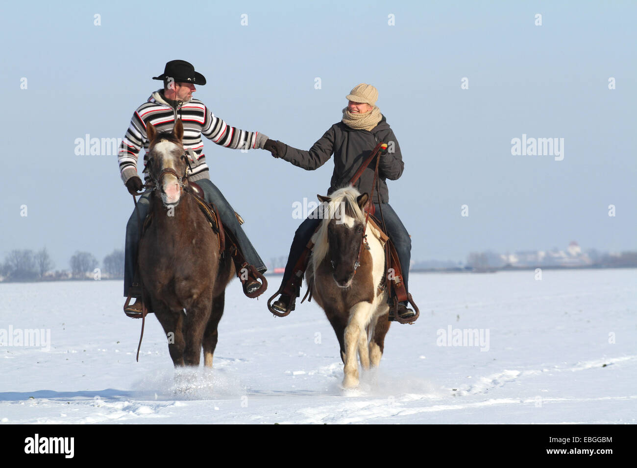 cavaliers dans la neige Banque D'Images
