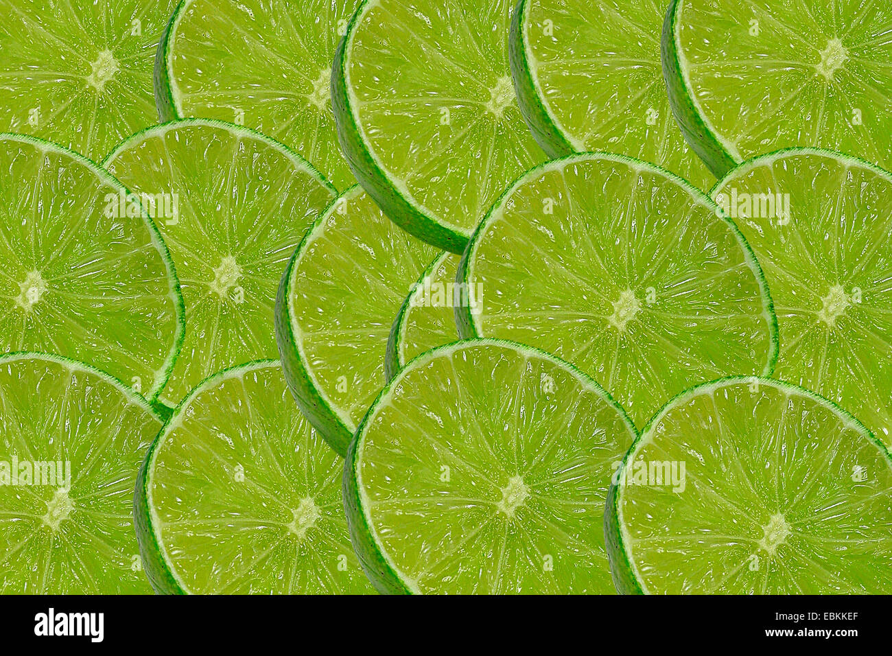Fruits de lime (Citrus aurantifolia), tranches de lime Banque D'Images