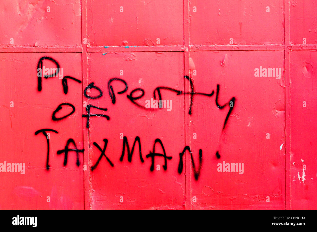 Propriété de Taxman graffitis sur des capacités à Bromley, dans le sud de Londres. Banque D'Images