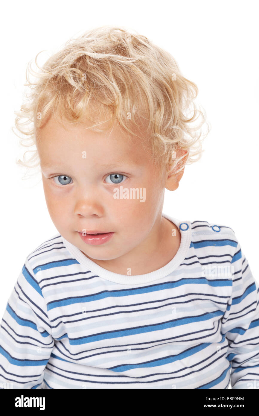 Les cheveux blancs et les yeux bleus du bébé. Isolé sur fond blanc Banque D'Images