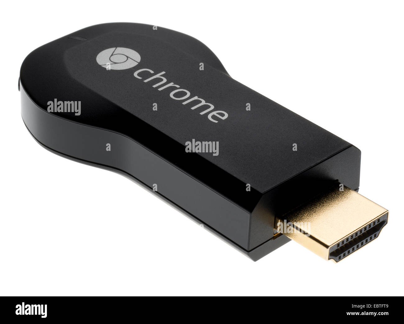 Google Chromecast media streaming appareil qui se branche sur port HDMI sur un téléviseur HD. Distribution d'eau ou un contenu à votre téléviseur. Banque D'Images