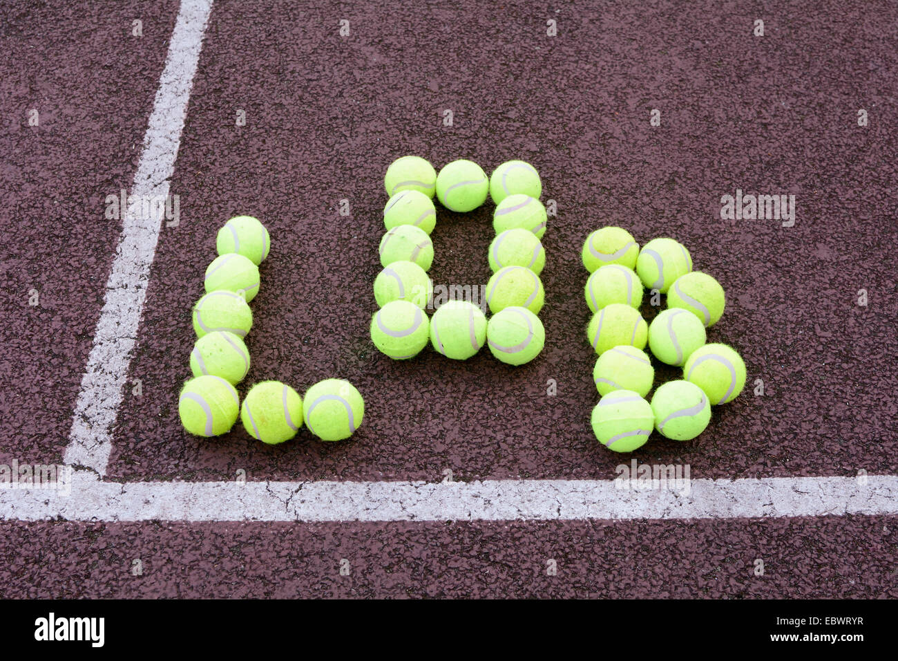 Tourné en lob Tennis balles de tennis Banque D'Images
