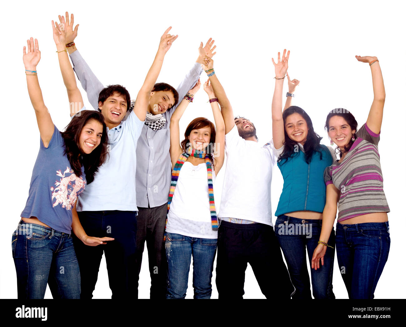 Happy group of friends with arms up Banque D'Images