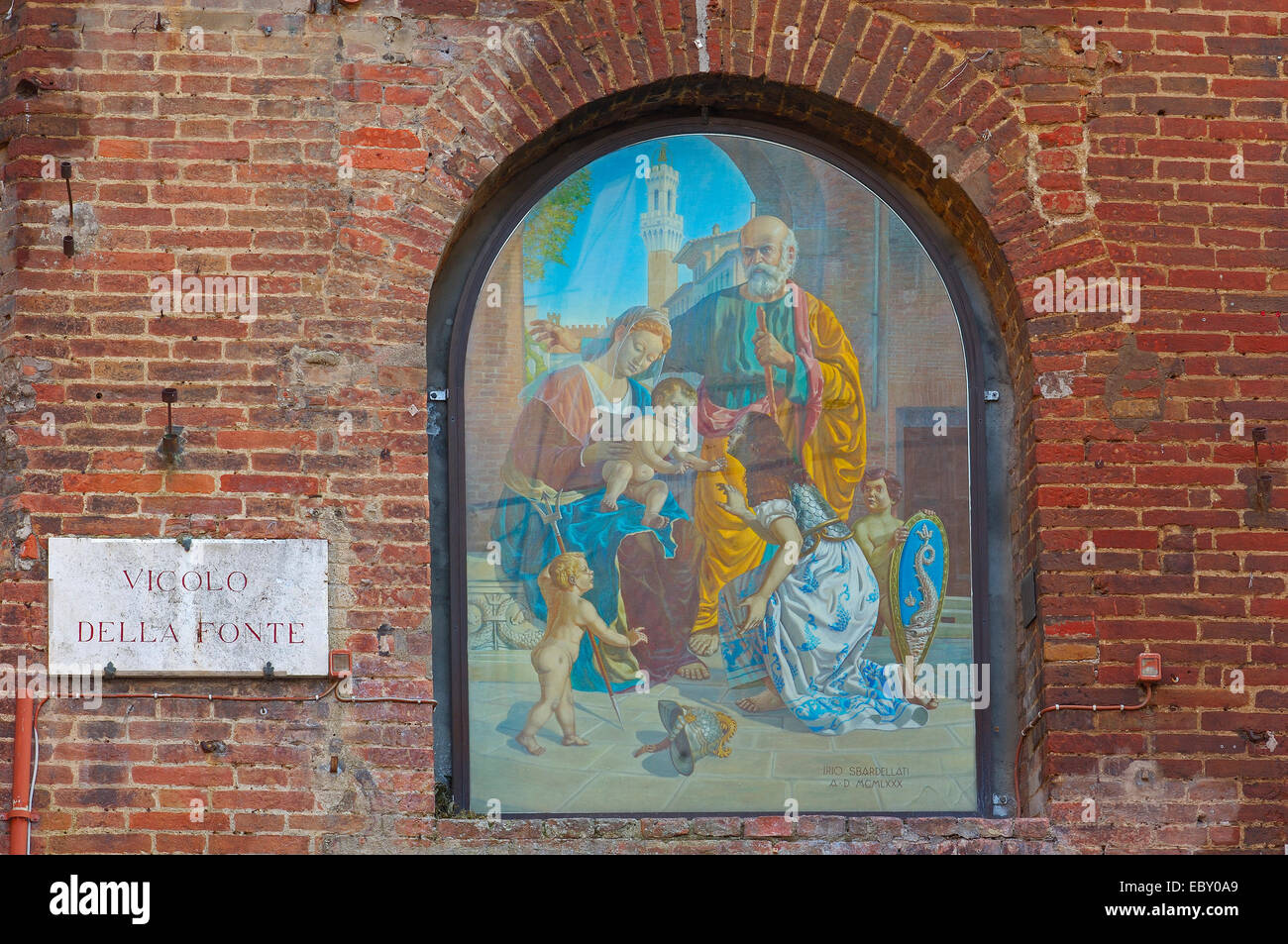 La peinture religieuse sur un mur, l'UNESCO Patrimoine Culturel Mondial, Sienne, Toscane, Italie, Europe Banque D'Images