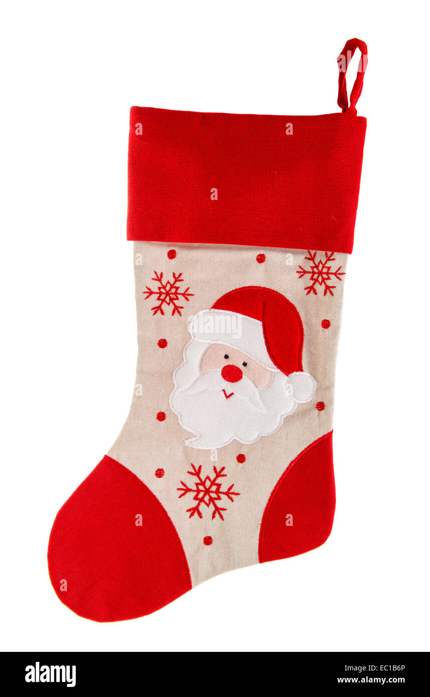 Chaussette rouge. bas de Noël avec le Père Noël et des flocons sur fond blanc, symbole des vacances d'hiver. Banque D'Images