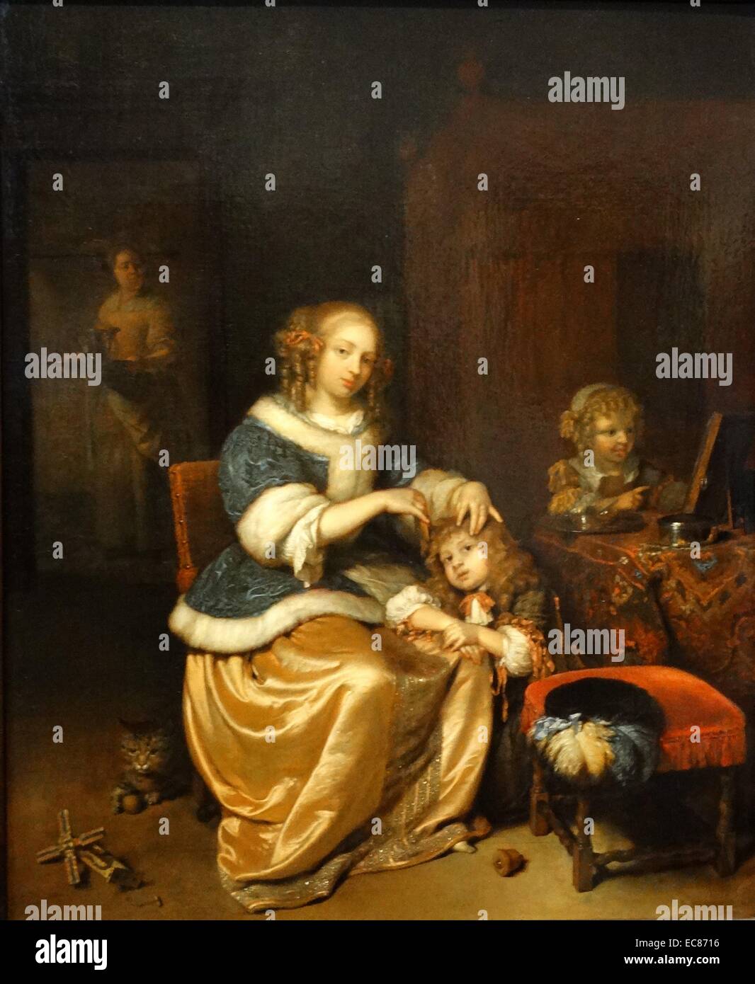La peinture intitulée "Soins de la mere' dépeint une mère peignant ses cheveux de l'enfant. Peint par Caspar Van (1639-1684). En date du 17e siècle Banque D'Images