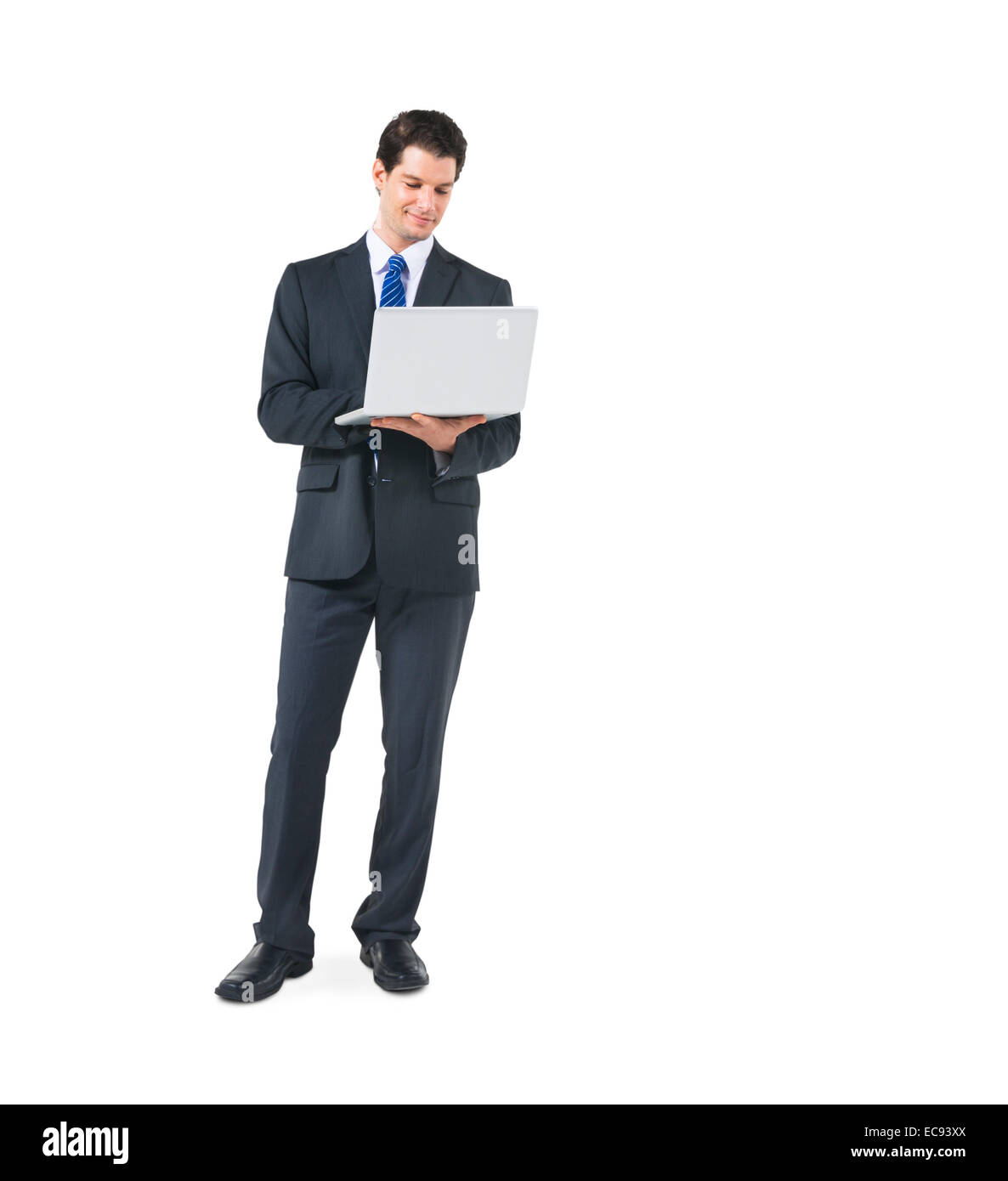 Un Businessman Holding a Laptop in a White Background Banque D'Images