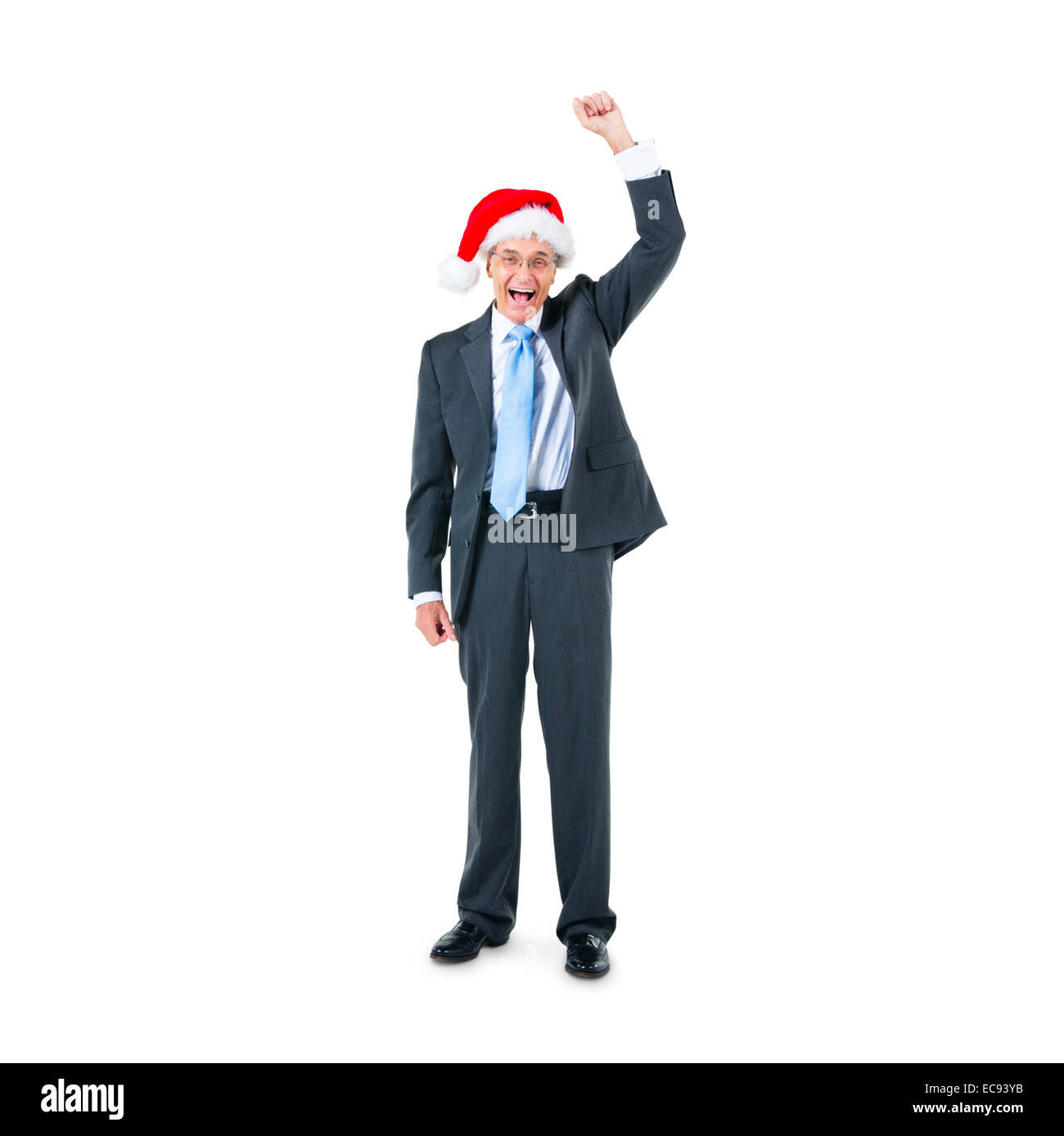 A Cheerful Businessman in a Santa Hat célébrant Banque D'Images