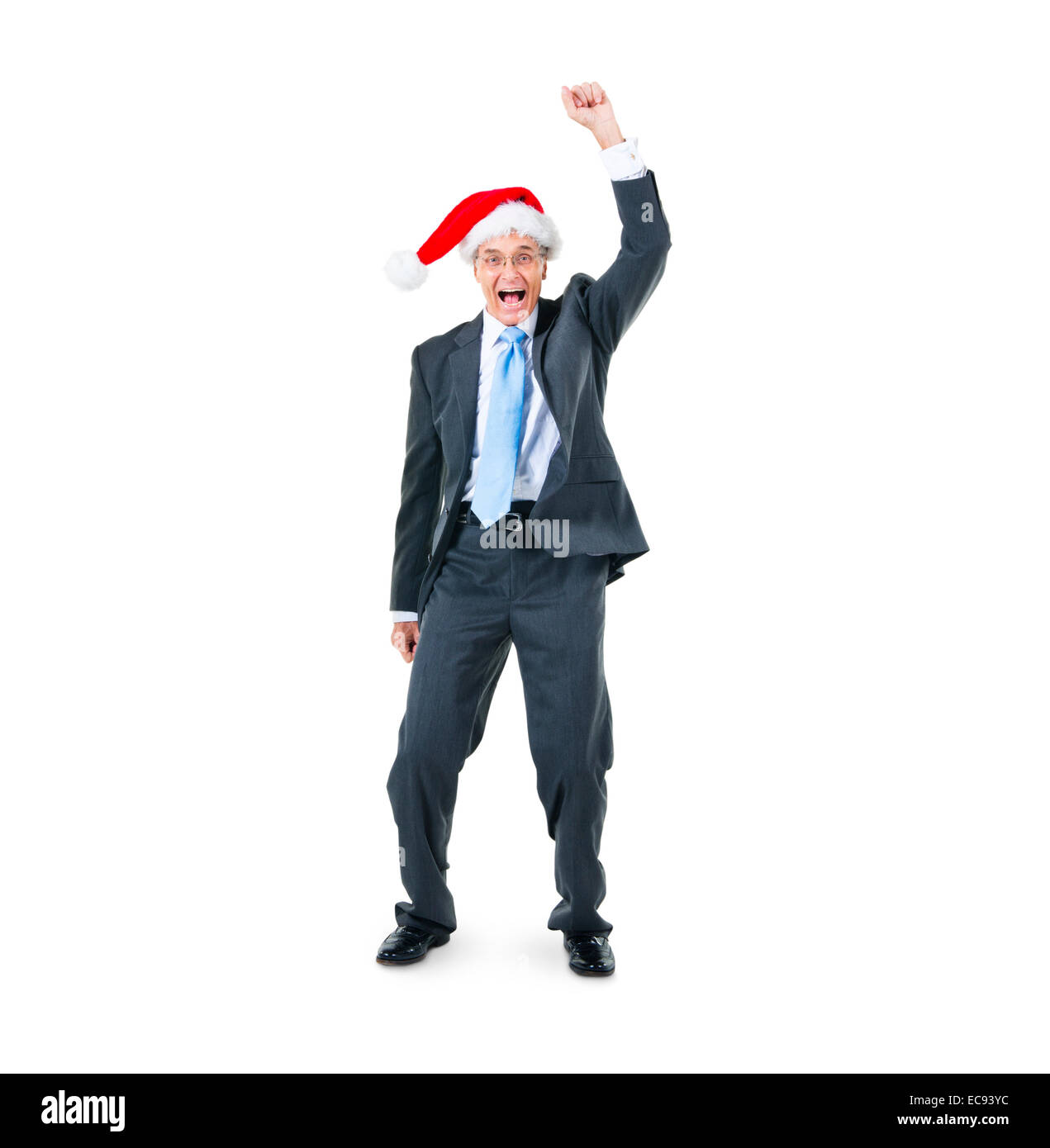 A Cheerful Businessman in a Santa Hat célébrant Banque D'Images