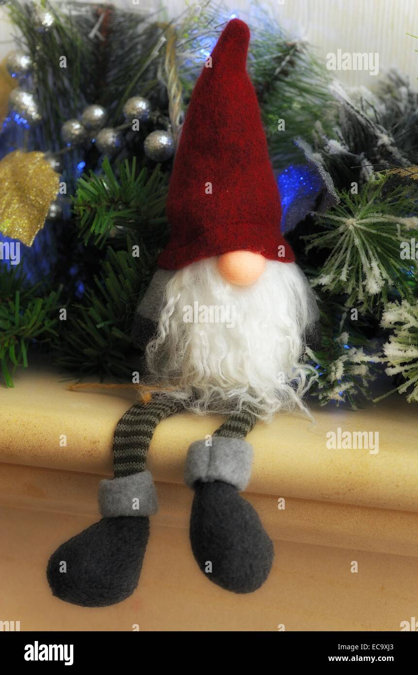 Gonk Noël assis sur une cheminée Banque D'Images