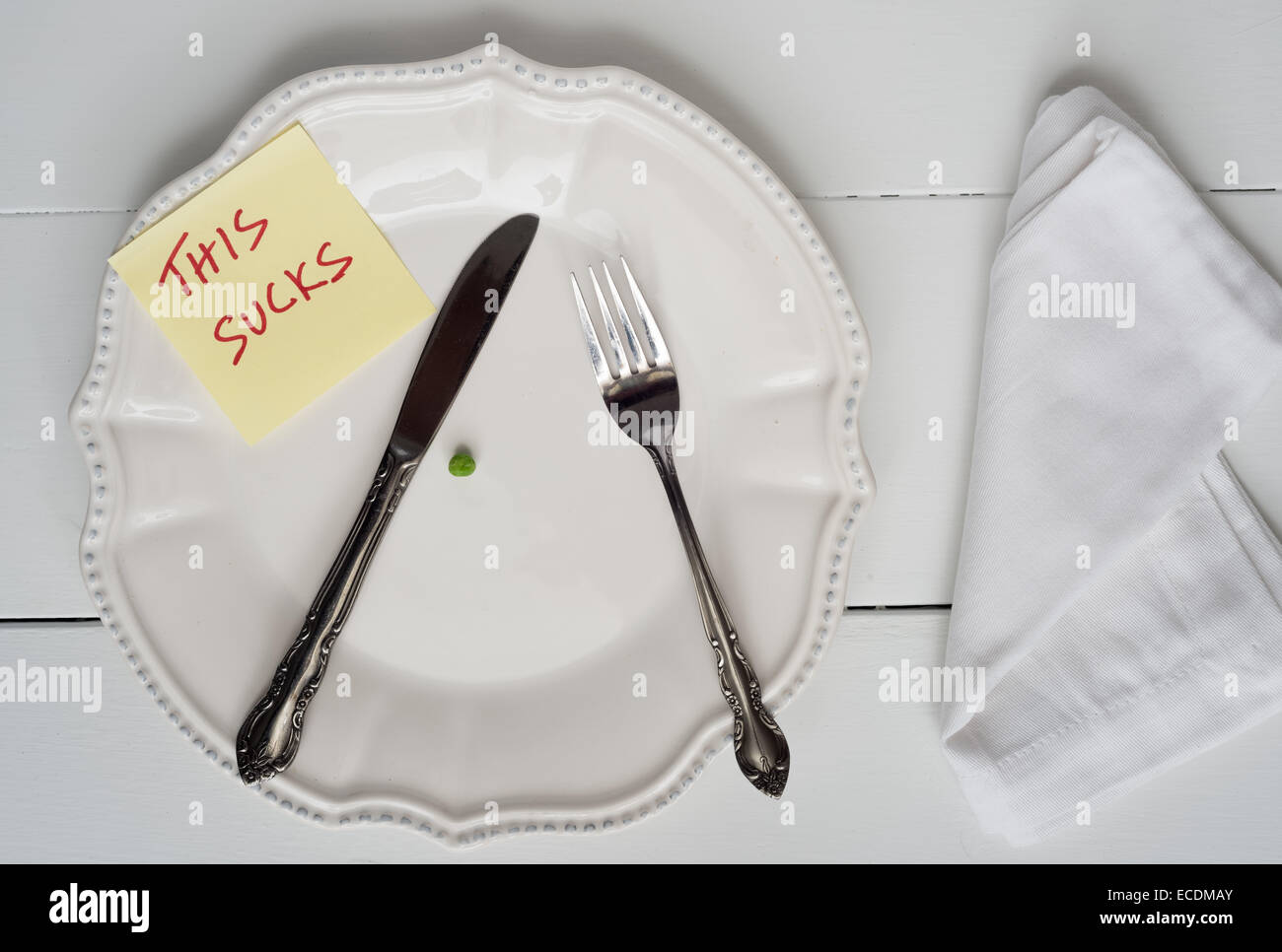 La perte de poids nouveau concept unique de l'année - pois sur une plaque avec cette note suce Banque D'Images