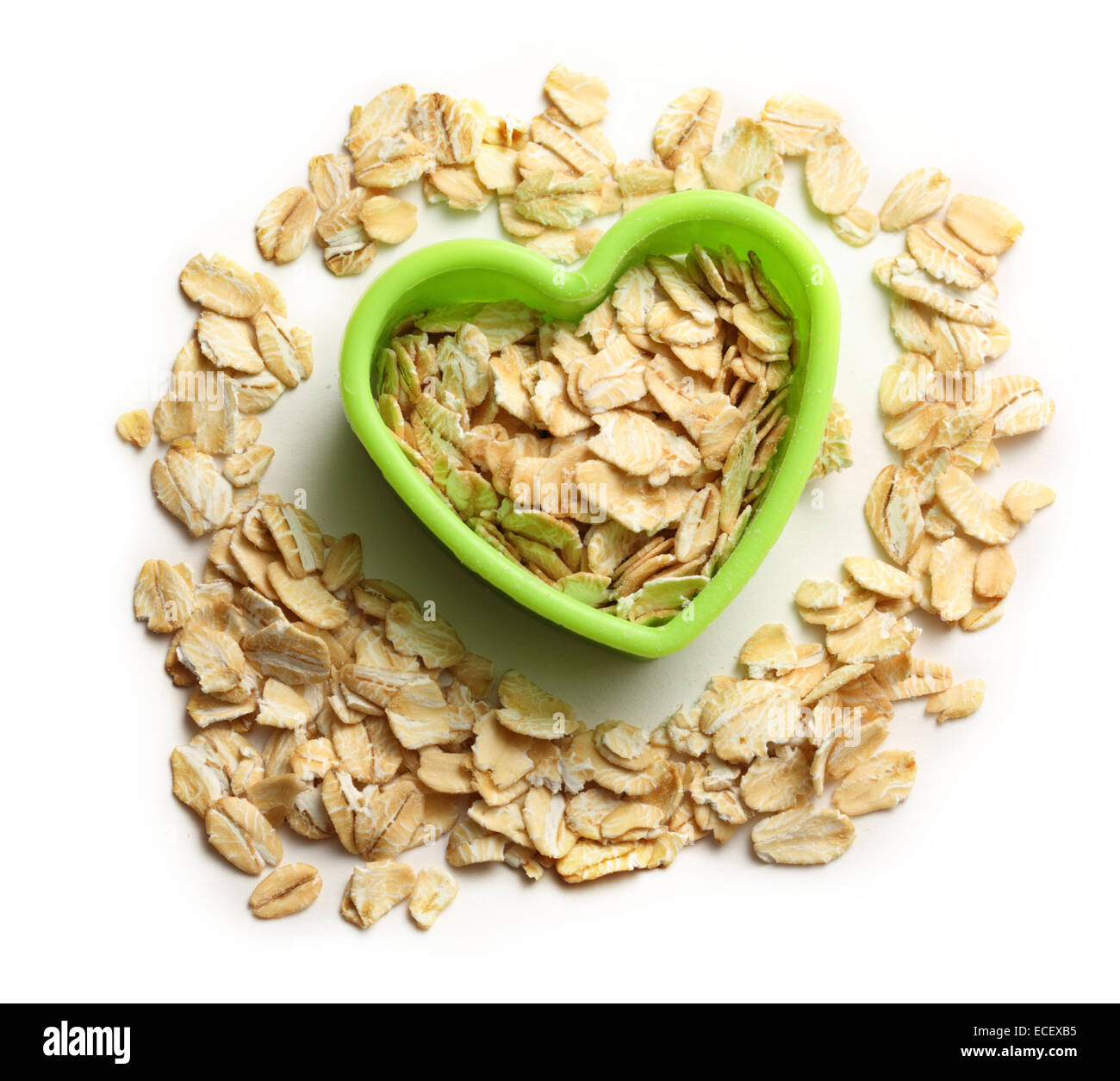 Les flocons d'avoine en forme coeur vert Banque D'Images