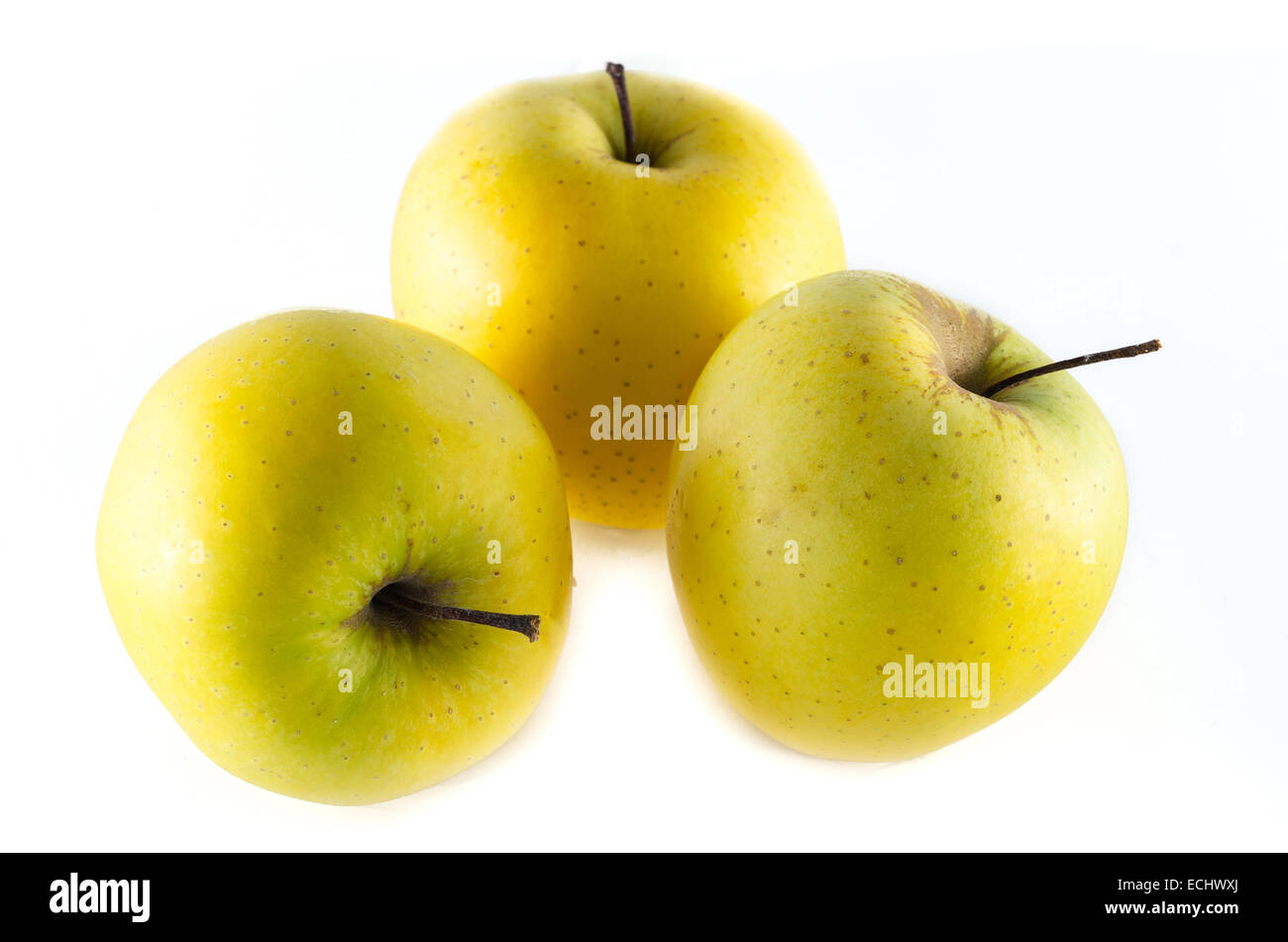 Pommes Golden delicious isolated on white Banque D'Images