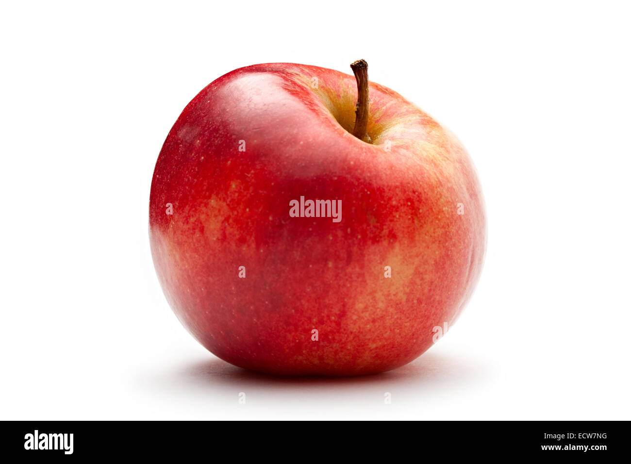Pomme rouge sur le livre blanc Banque D'Images