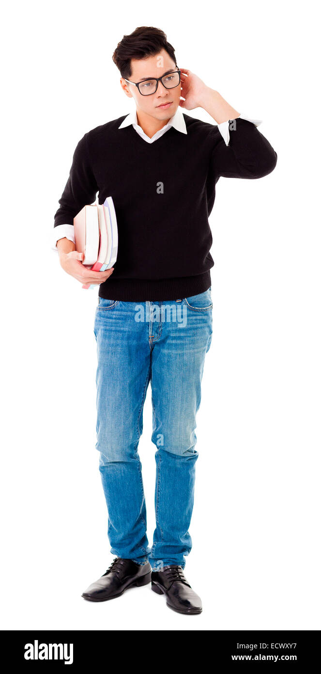 Full Length portrait of young man holding books Banque D'Images