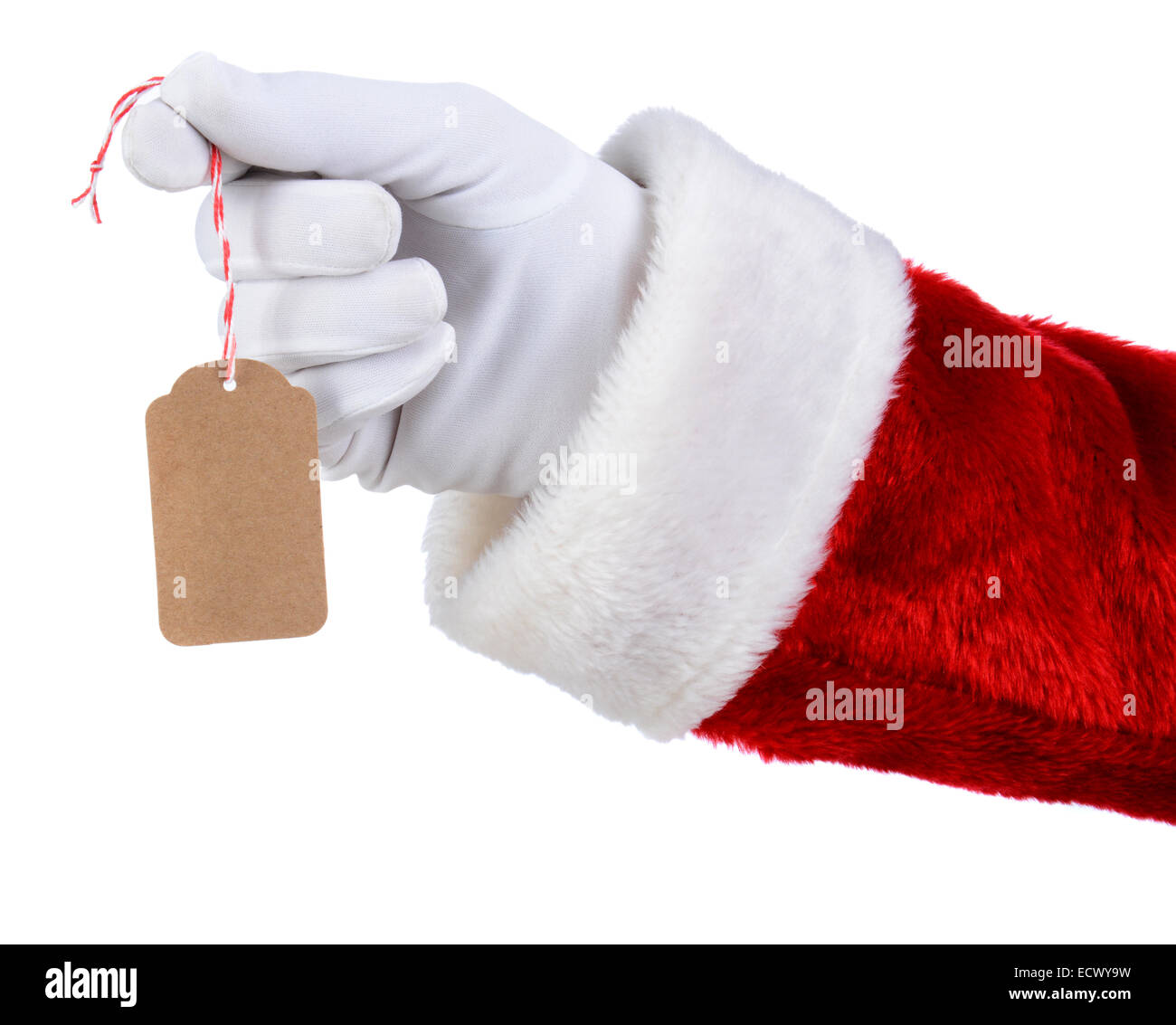 Gros plan du Père Noël hand holding a blank gift tag sur un fond blanc. Seulement Santa's white main gantée costume rouge sont affichées. Banque D'Images