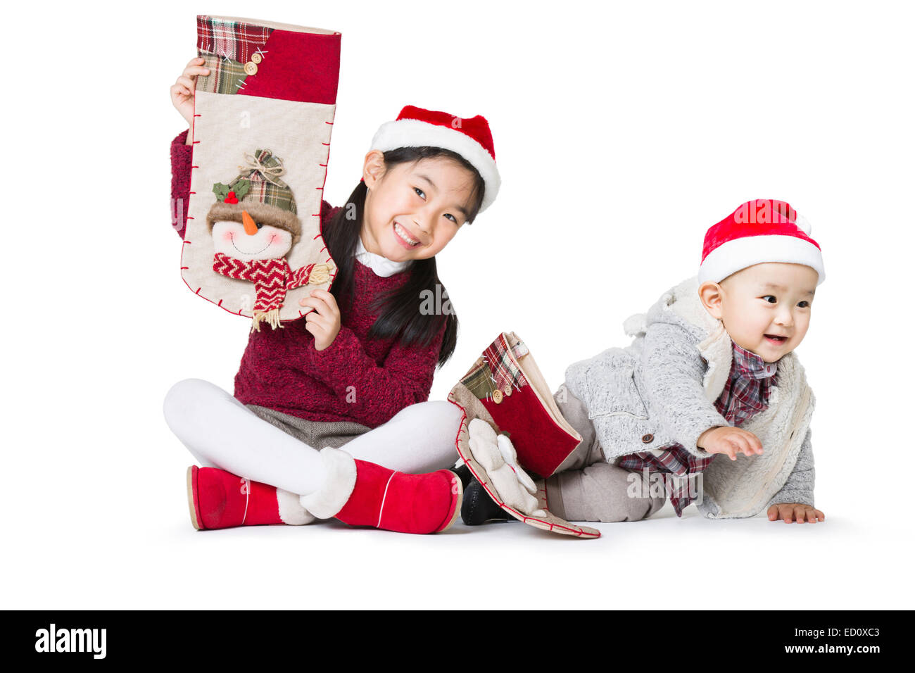 Heureux soeur et frère de Santa hats Banque D'Images