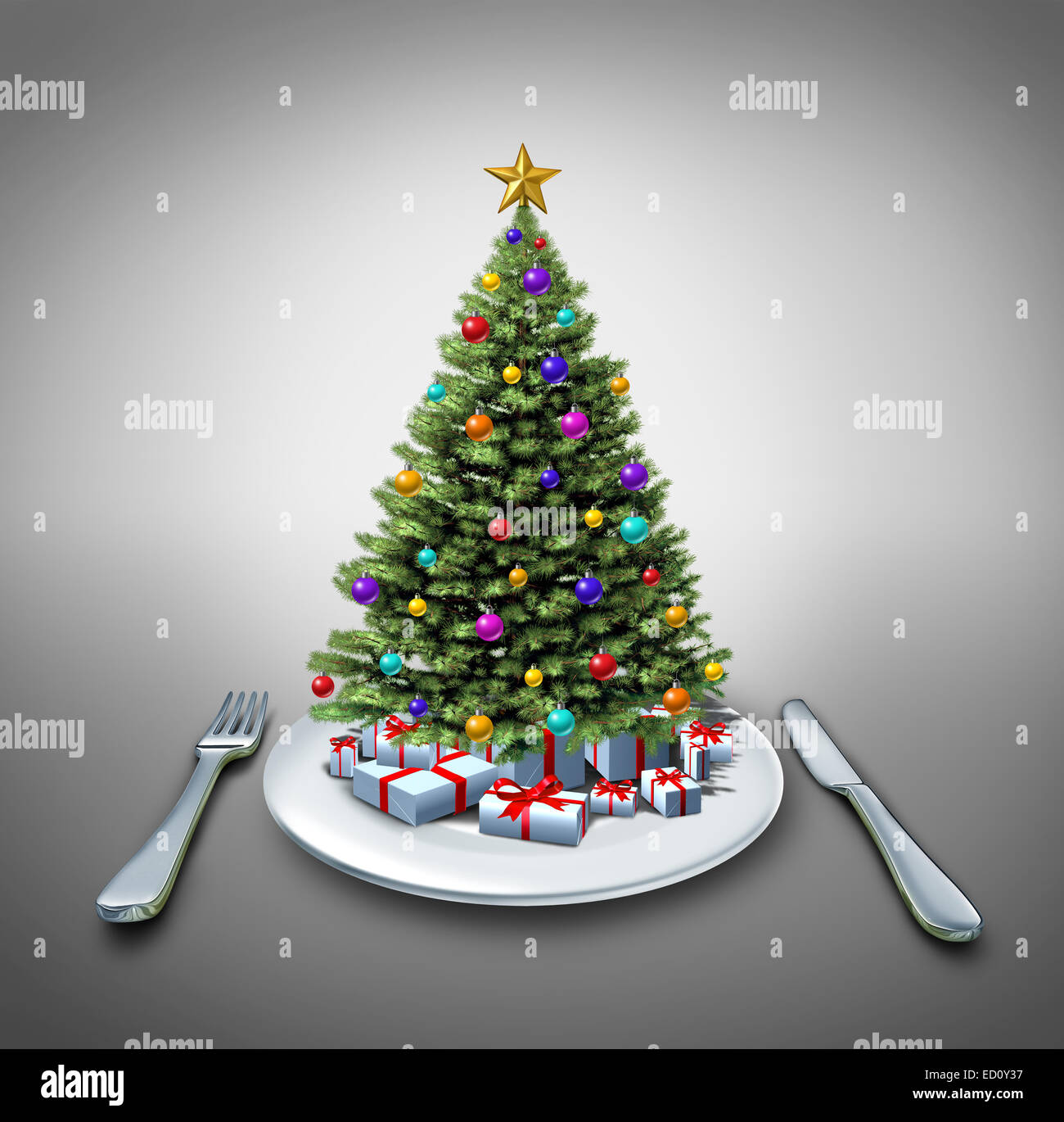 Dîner de célébration et d'hiver recette alimentaire comme un pin décoré arbre de Noël sur une table avec une assiette fourchette et couteau comme un symbole de manger pendant les vacances. Banque D'Images