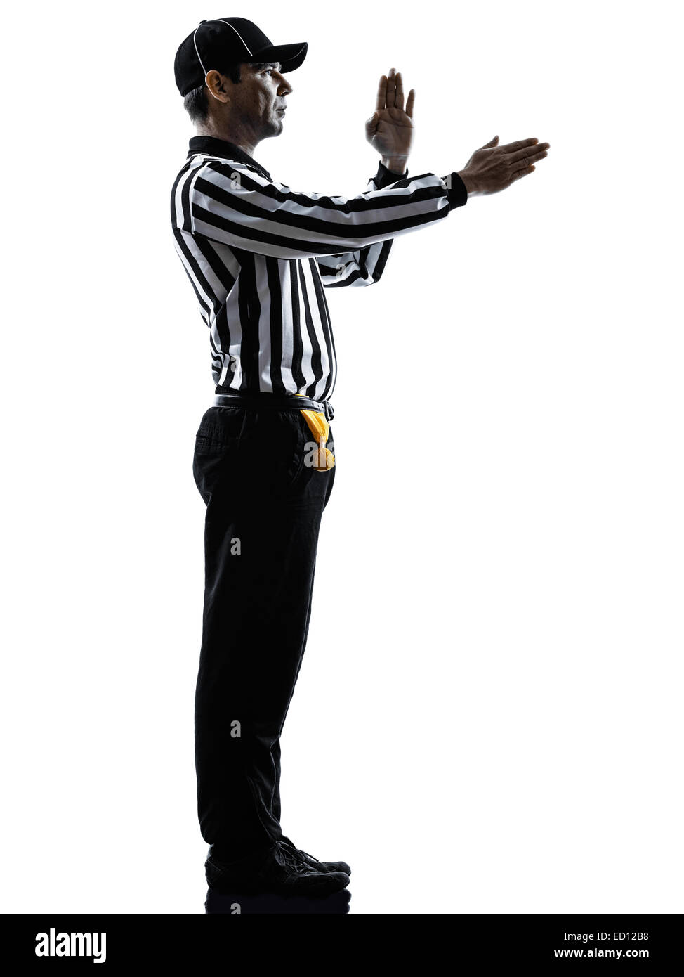 Les gestes de l'arbitre de football américain en silhouette sur fond blanc Banque D'Images