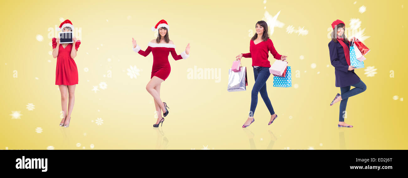 Libre de brunette in winter clothes holding shopping bags Banque D'Images