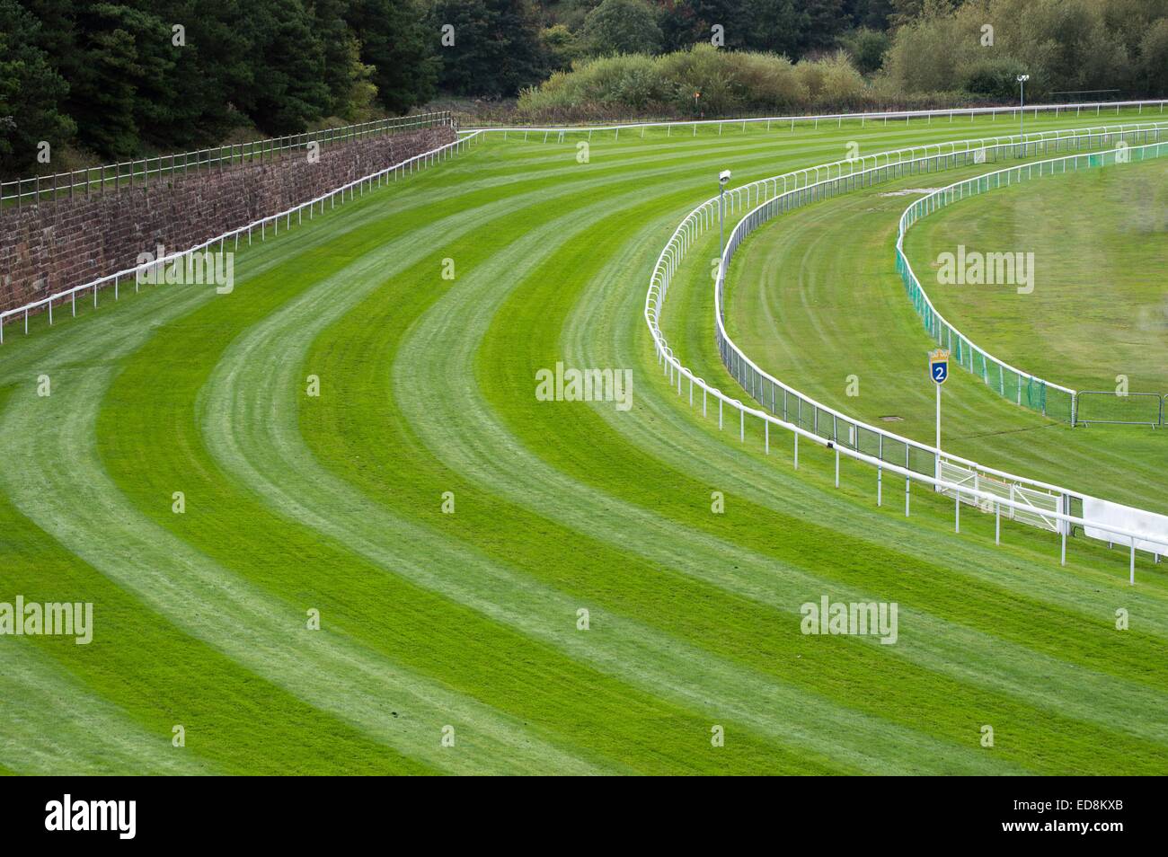 Un brusque virage d'une course de chevaux course Banque D'Images