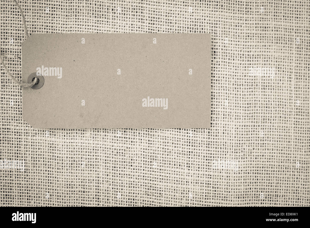 Tag Papier vierge sur fond de toile Banque D'Images