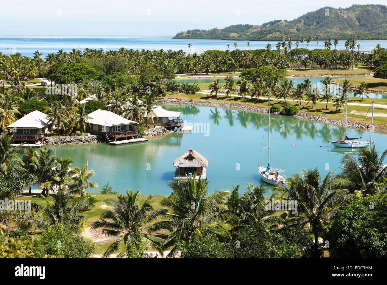 Bungalows au bord de l'Eau, Mers du Sud, Plantation Island ou Malolo Lailai, Bay Islands, Fidji Banque D'Images