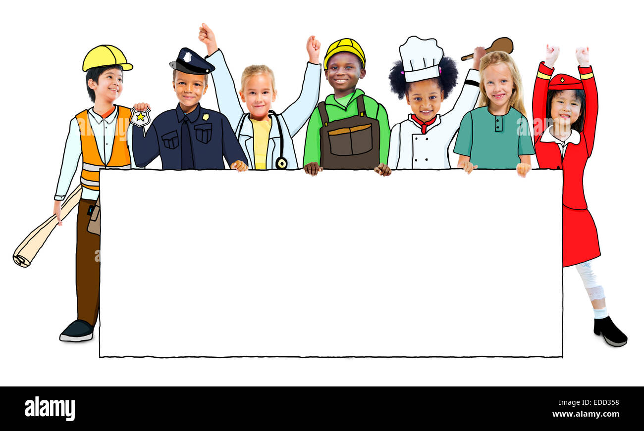 Groupe d'enfants en uniforme d'emploi Rêves Holding banner with Copy Space Banque D'Images
