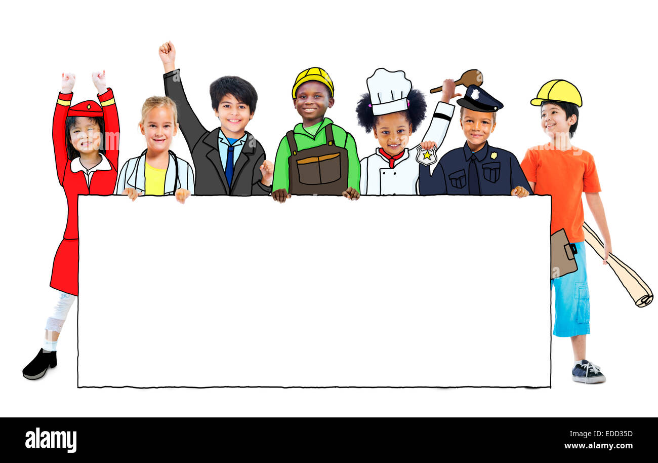 Groupe d'enfants en uniforme d'emploi Rêves Holding banner with Copy Space Banque D'Images