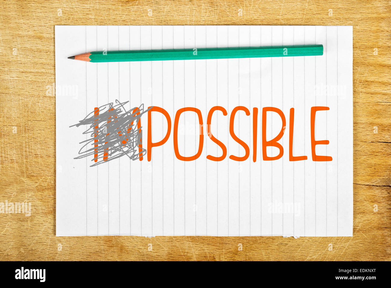 Impossible est possible Concept avec crayon et feuille de papier. Banque D'Images