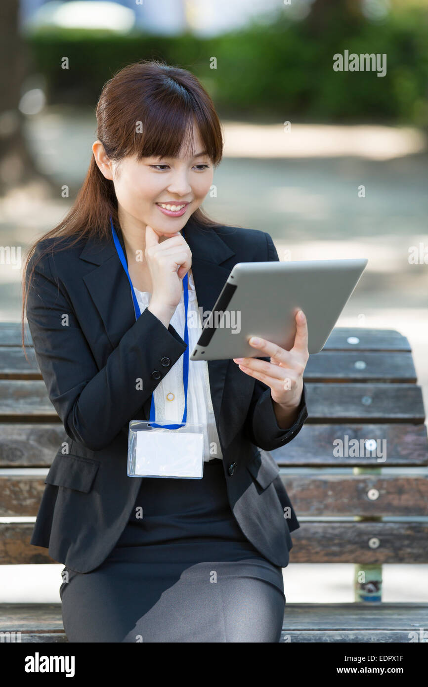 Businesswoman Using Tablet Computer Banque D'Images
