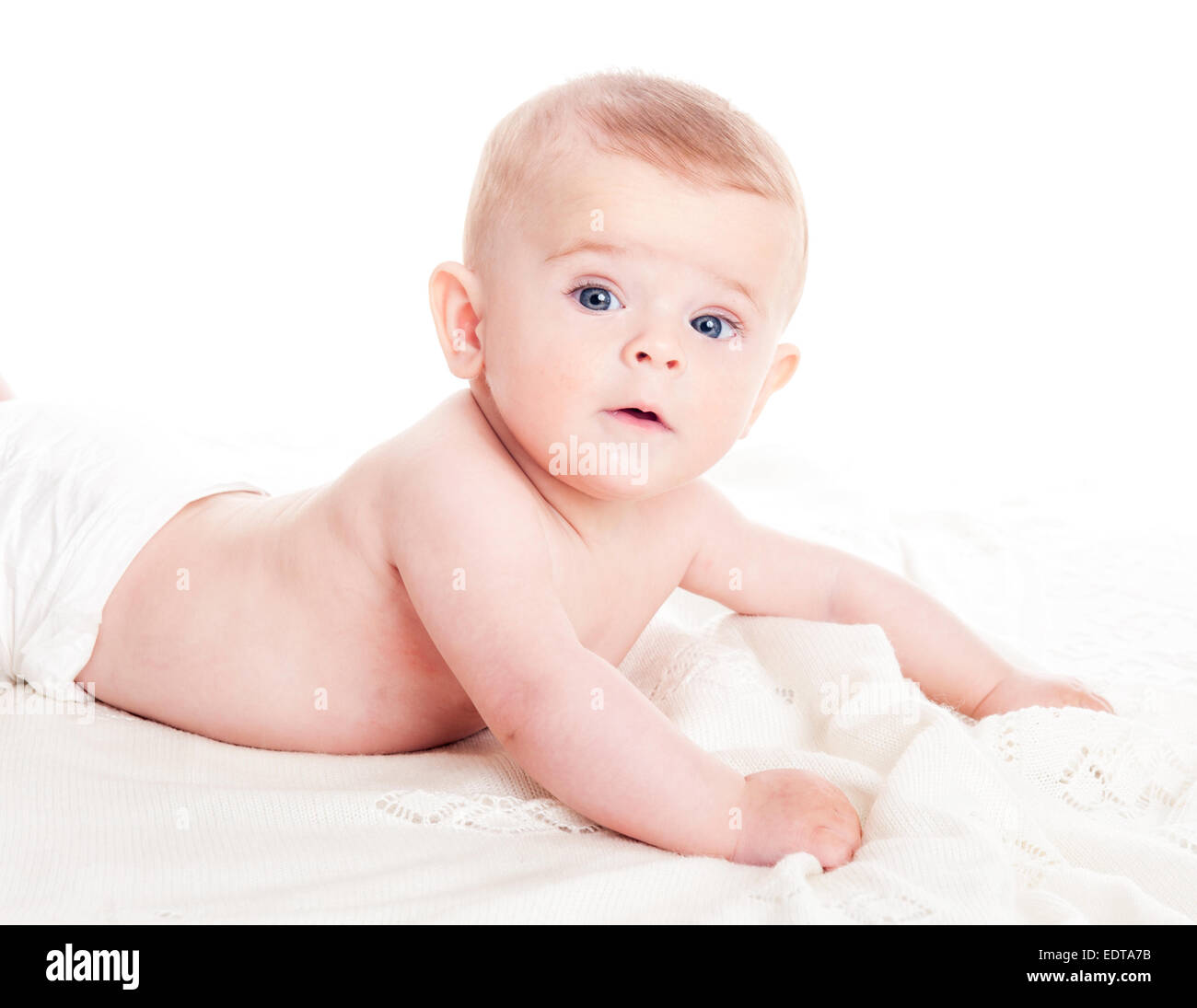 Mignon petit garçon de 4 mois sur un fond blanc Banque D'Images