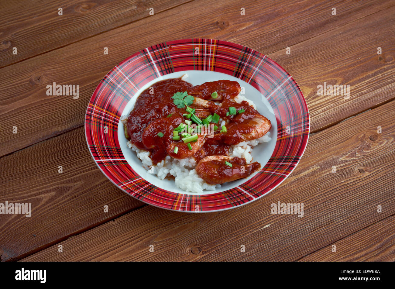 Créole crevettes - plat d'origine créole de Louisiane .les crevettes cuites dans le mélange de tomates, de céleri et de poivron, épicé et servir Banque D'Images